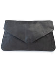 Riley Clutch in soft black leather, slim and stylish purse with a sleek envelope design, perfect for night outings.