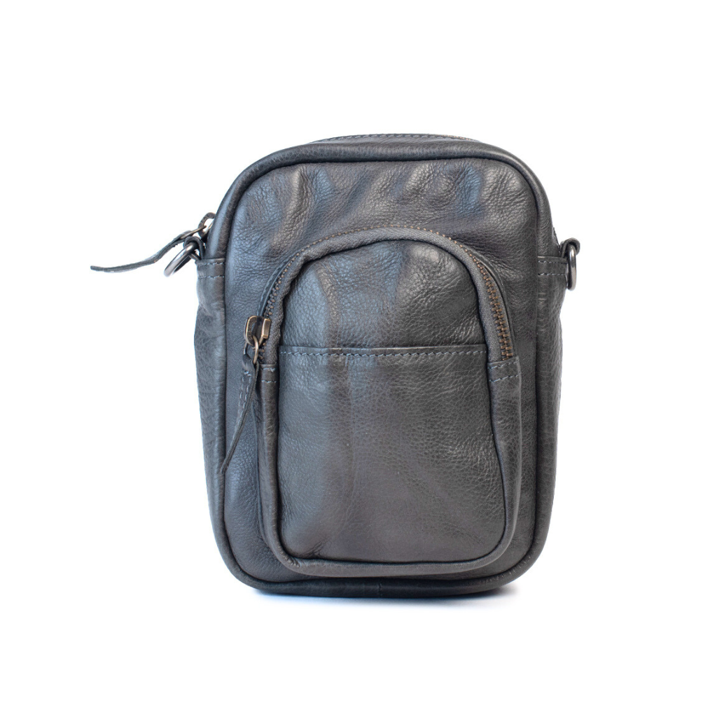 Face the Music mini camera bag in dark grey leather with front pocket and zip closure, perfect for daily essentials.