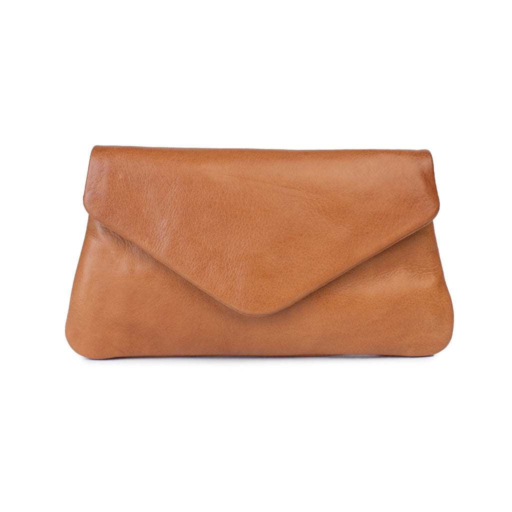 Quinn purse in tan leather with a fold over flap, featuring a magnetic closure and sleek design for stylish organization.