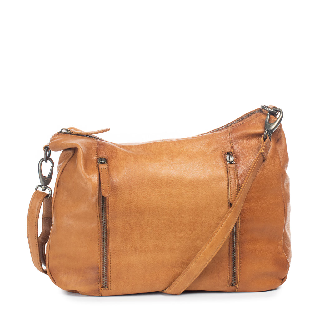 Poppy Bag: Relaxed over-the-shoulder bag in tan leather with front zips and adjustable straps, ideal for storing essentials.