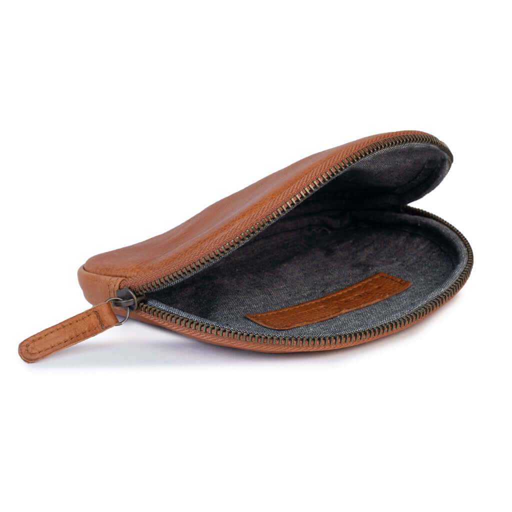 Open leather purse in tan with zip closure, ideal for organizing small items, showcasing elegant design and soft leather.