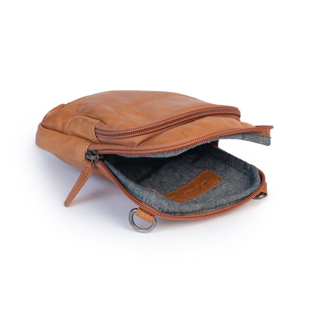Open Sophie Bag showing soft leather interior and zip closure, ideal as a stylish leather purse for on-the-go adventures.