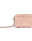 Small pink leather purse with detachable wrist strap and zip-close section for organization.
