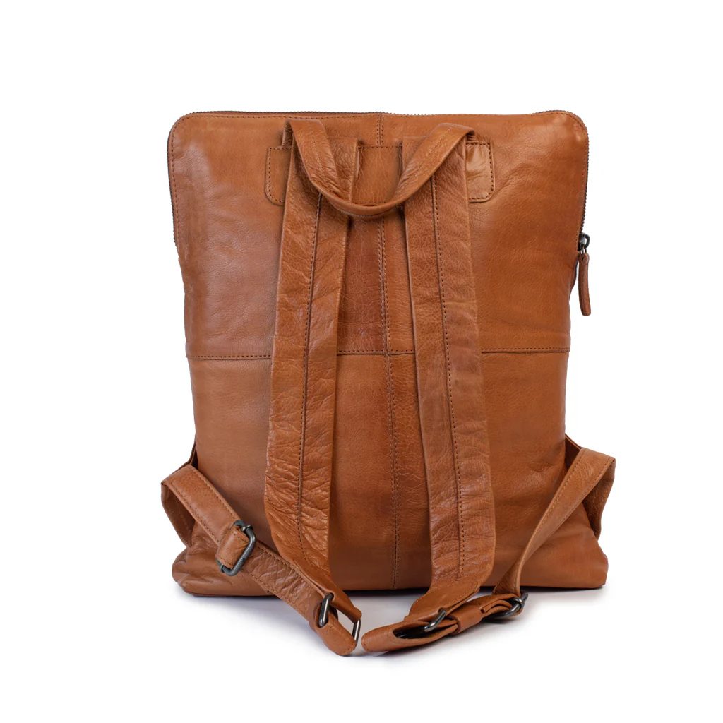Brooklyn leather backpack with wide adjustable straps, minimalist design, and durable exterior, perfect for everyday adventures.