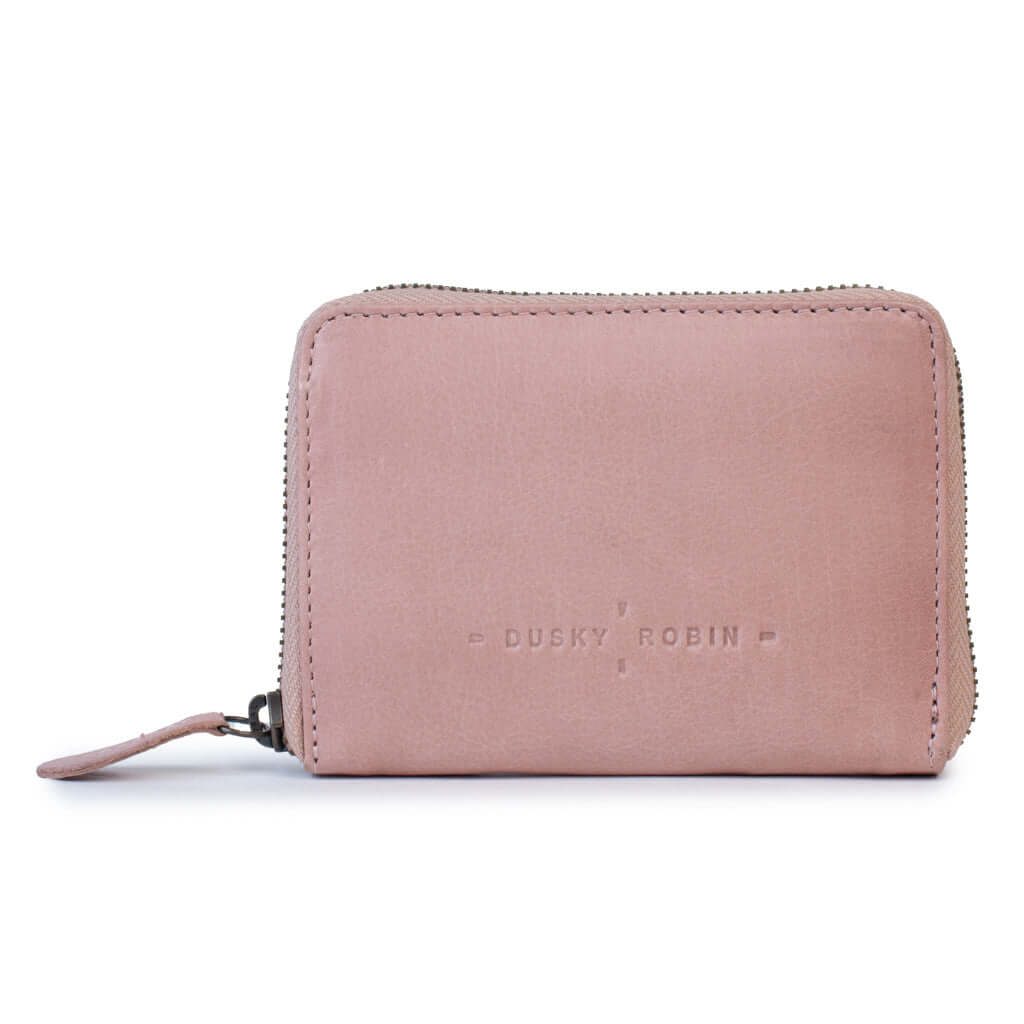 Drew Wallet in soft pink leather, stylish zip-around design with embossed logo, perfect compact leather purse.