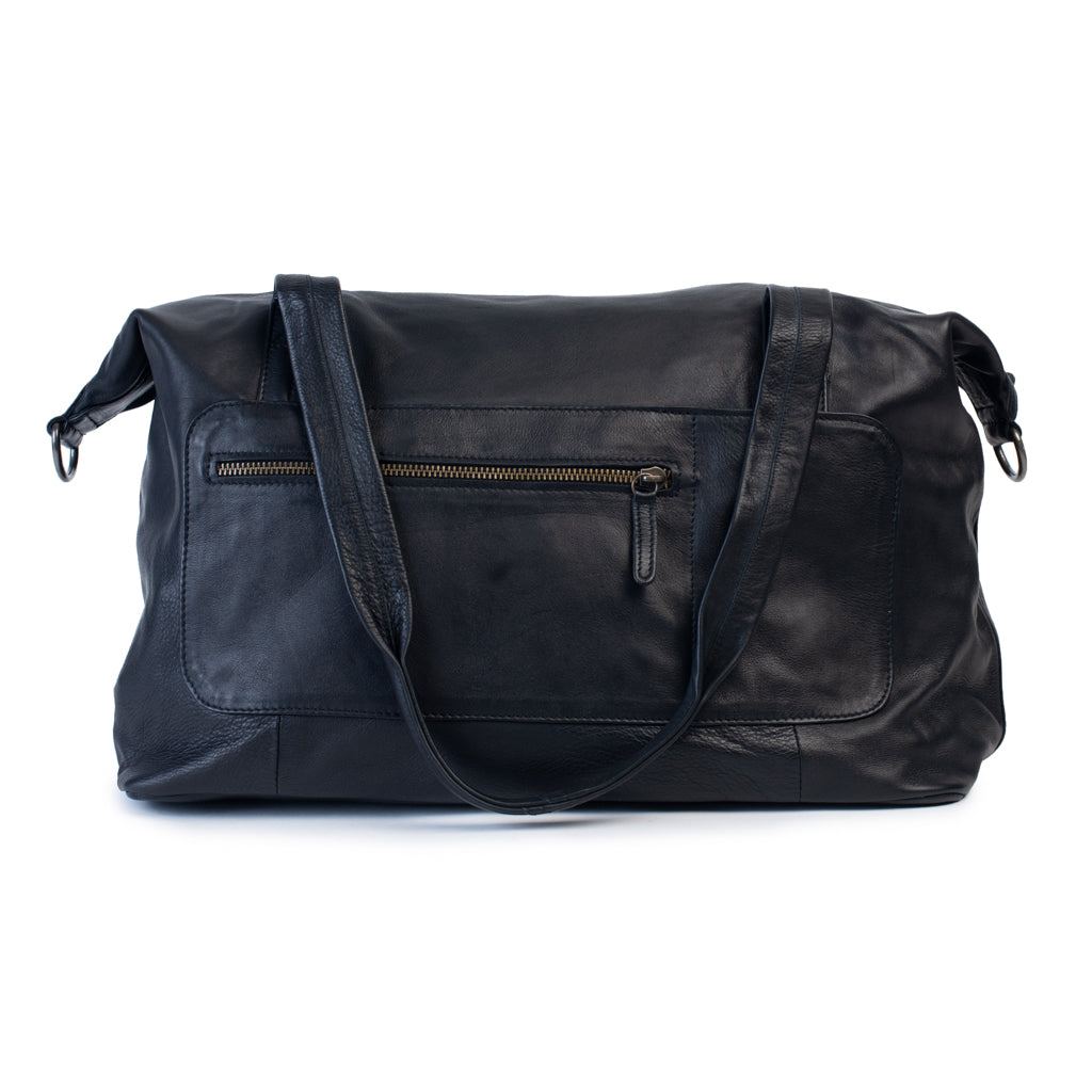 Hannah Overnight Bag in black leather with external zip pocket and adjustable straps, perfect for stylish getaways.