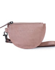 Dusty pink leather coin purse with wrist strap and zip closure, perfect for coins and essentials.