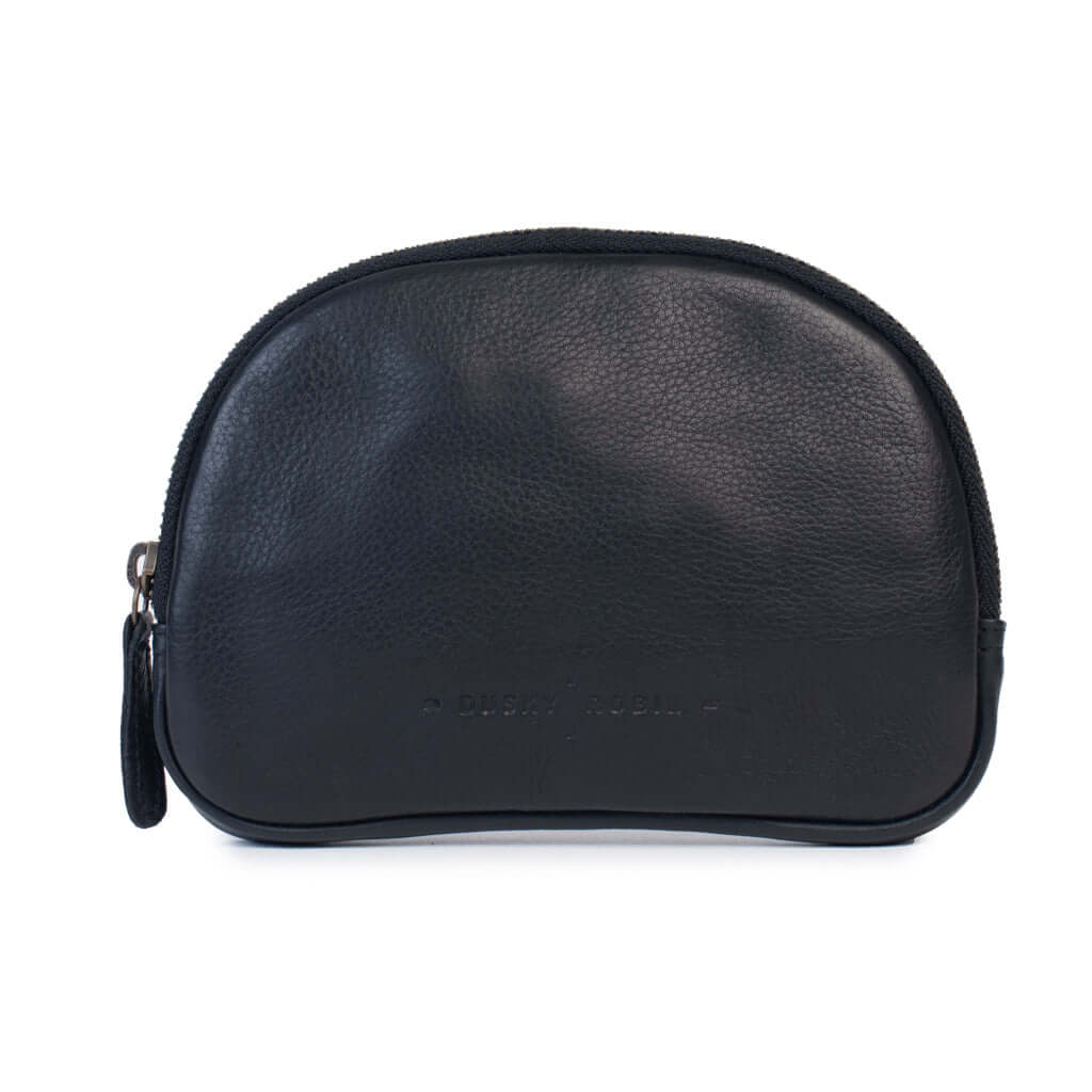 Romi leather purse in black, lightweight design with zip closure, perfect for organizing small goods.