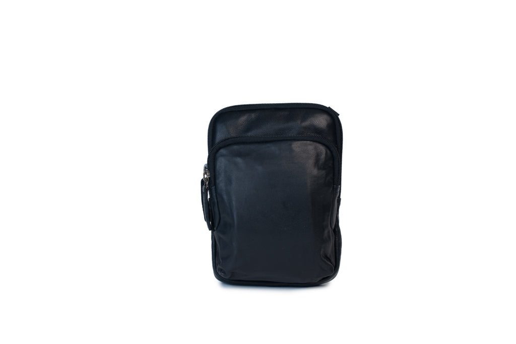 Sophie Bag, a stylish leather purse, featuring a minimalist design and adjustable strap for versatile use.