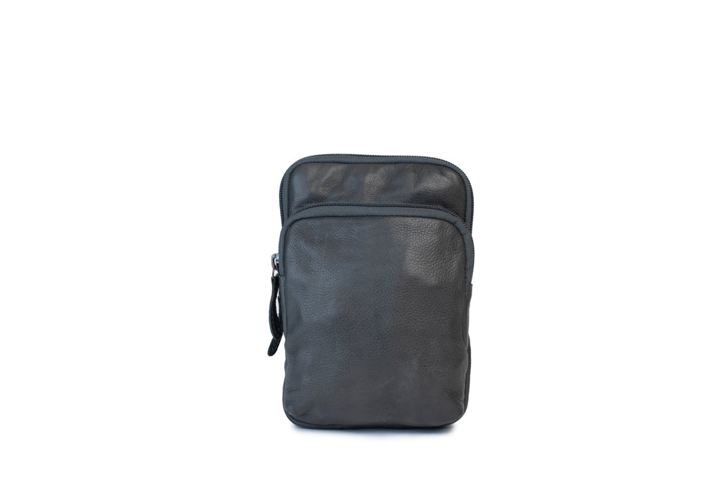 Sophie Bag: Stylish black leather purse with adjustable strap and zip closures, perfect for exploring in style.