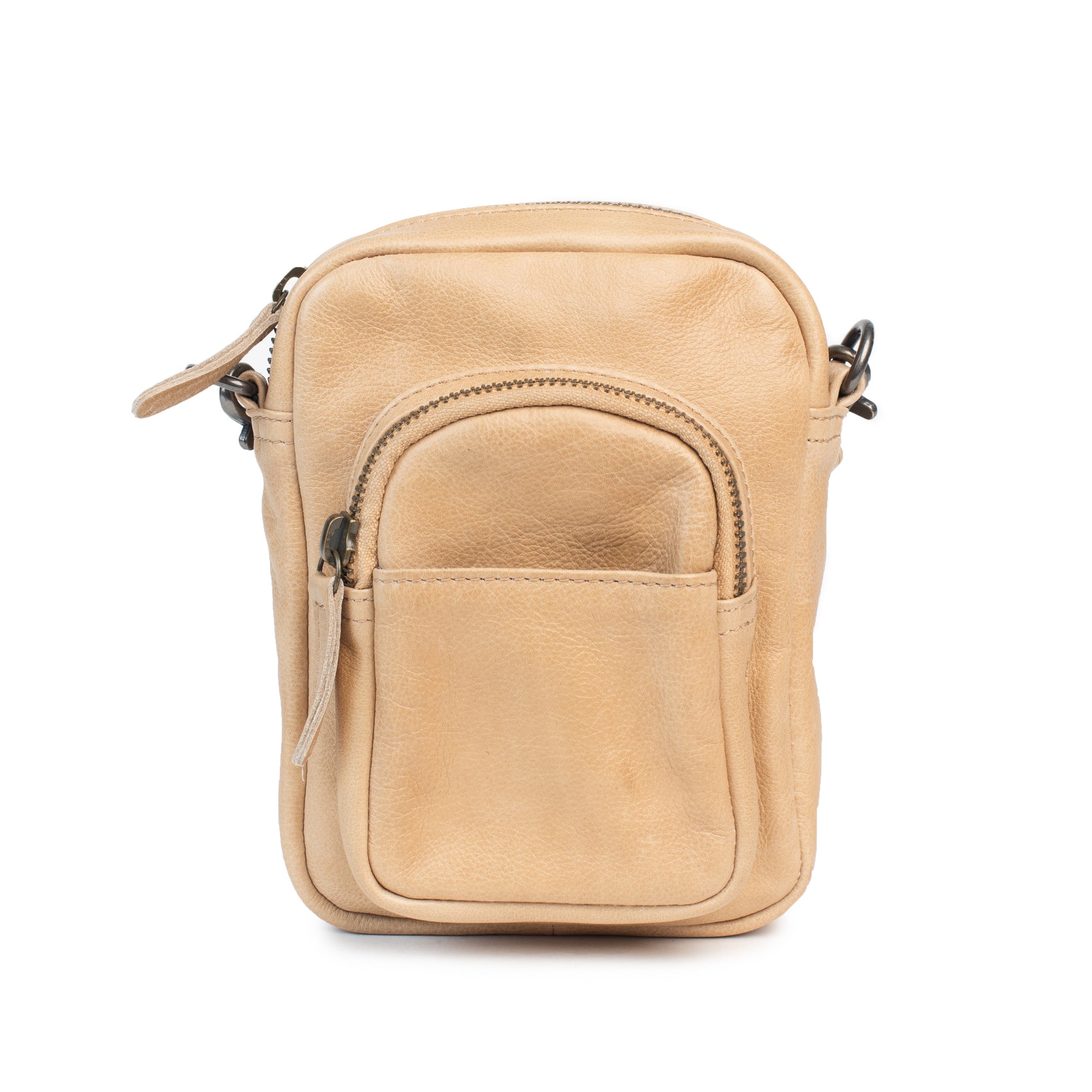 Face the Music bag, a mini leather camera bag with zip closure and front pocket, perfect for daily essentials.