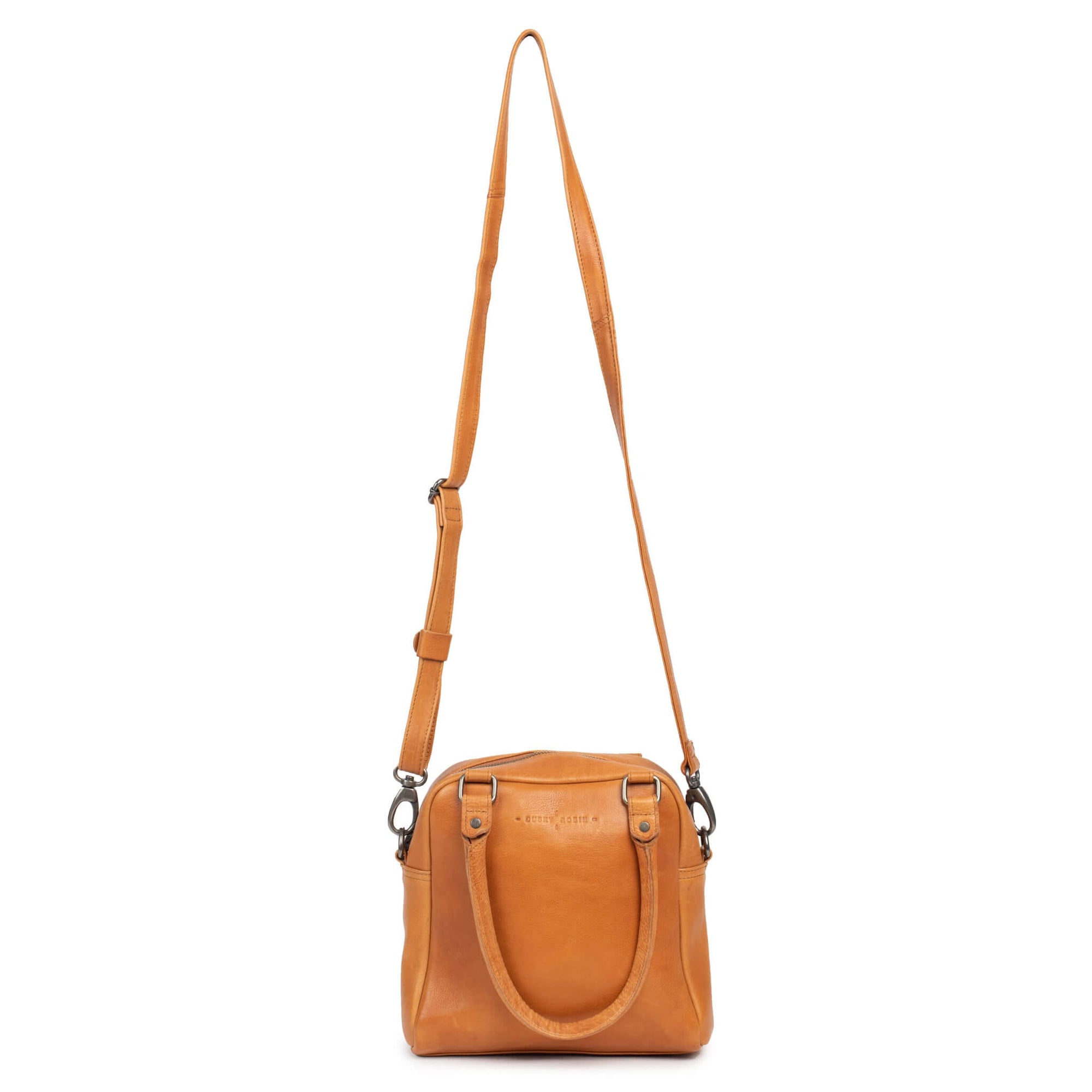 Suki leather purse by Dusky Robin, tan color, featuring a structured design and removable crossbody strap.